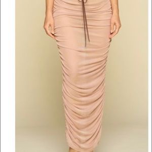 See through mesh ruched skirt. Cream colored.